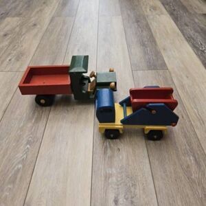 2 vintage Romania toy wooden trucks colorful, moving parts collectible